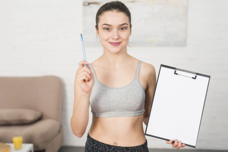 fitness-girl-showing-folder