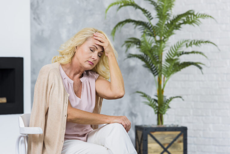 Woman Struggling with Menopause Symptoms