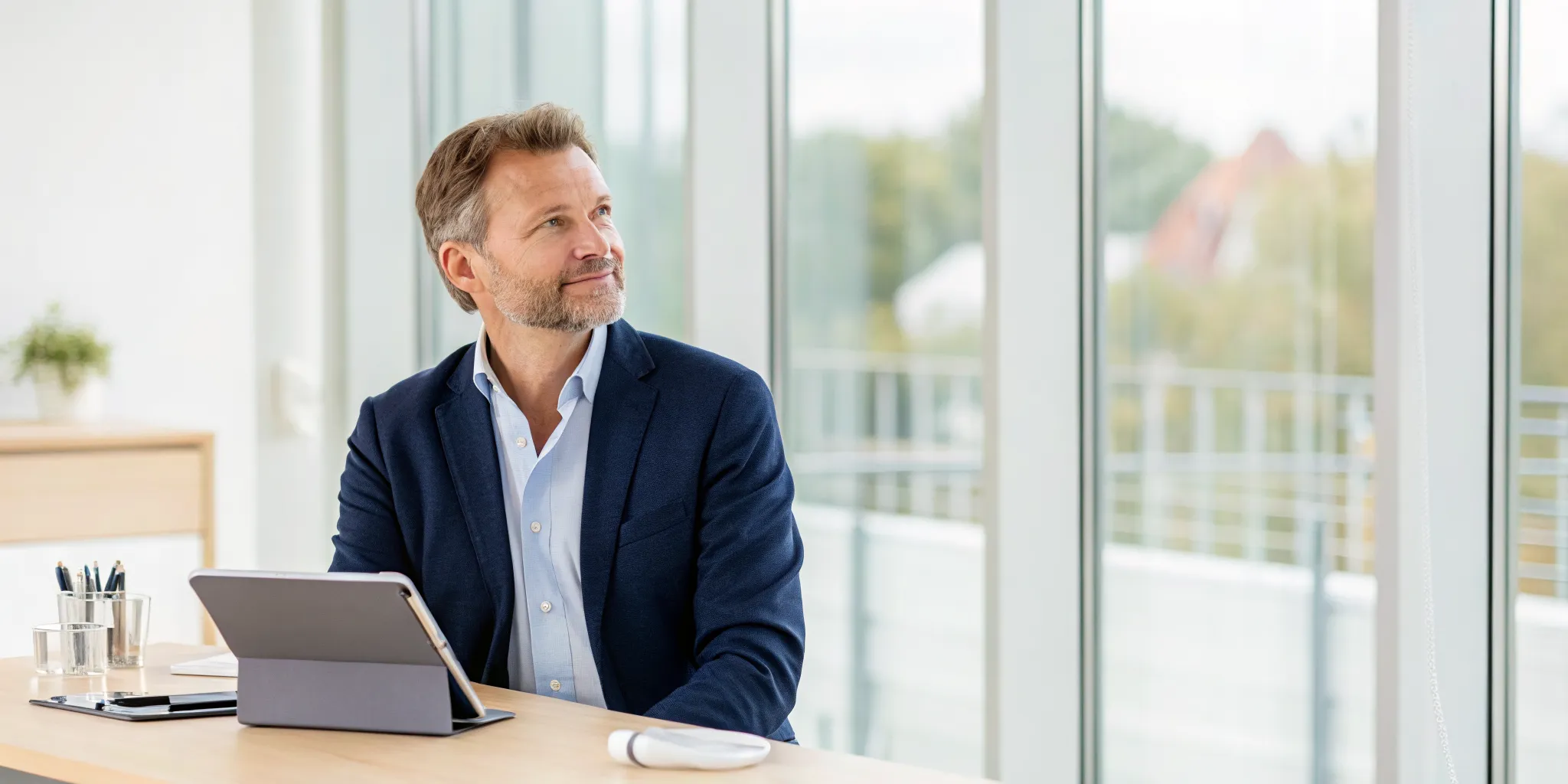 Man at his desk learning about bioidentical hormone replacement therapy for men.